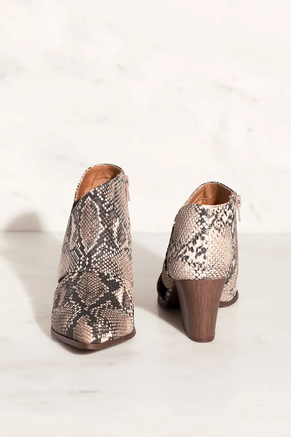 Groove With Me Snakeskin Cut-Out Booties