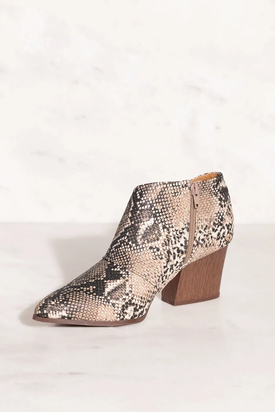 Groove With Me Snakeskin Cut-Out Booties